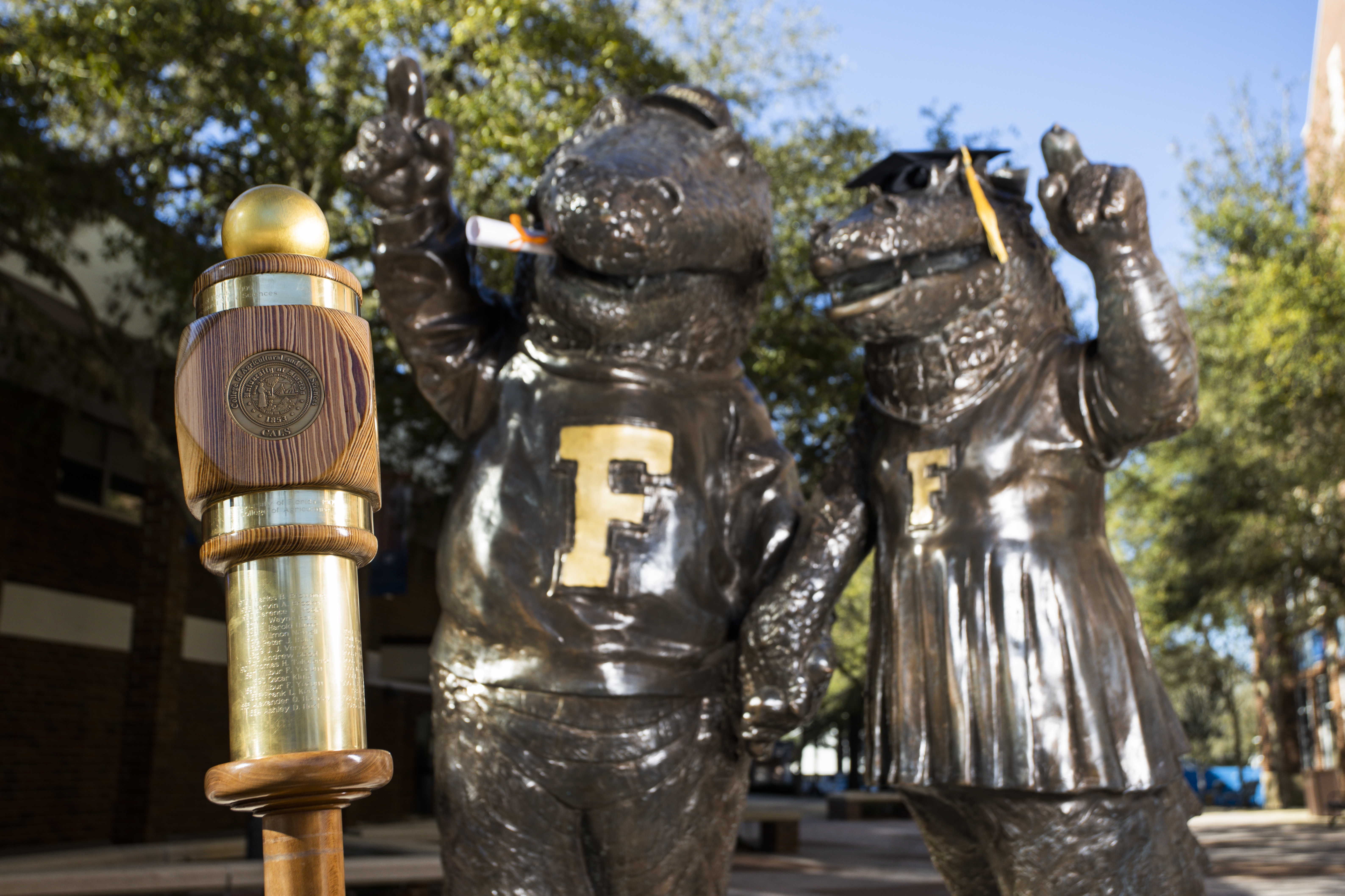 Albert and Alberta statue in front of Emerson Alumni Hall.